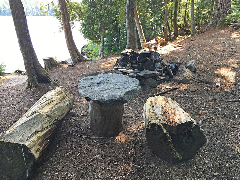 Red Pine Bay Campsite #1 fire pit and seating