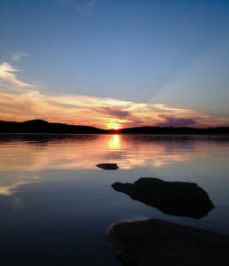 Watching the beautiful sunset on Three Mile Lake