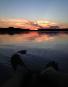 Sitting and watching the sunset on Three Mile Lake
