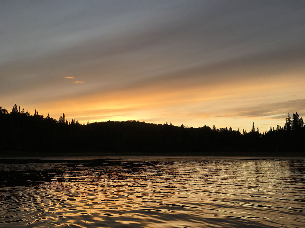 Watching the sunset from my canoe on Misty Lake in Algonquin
