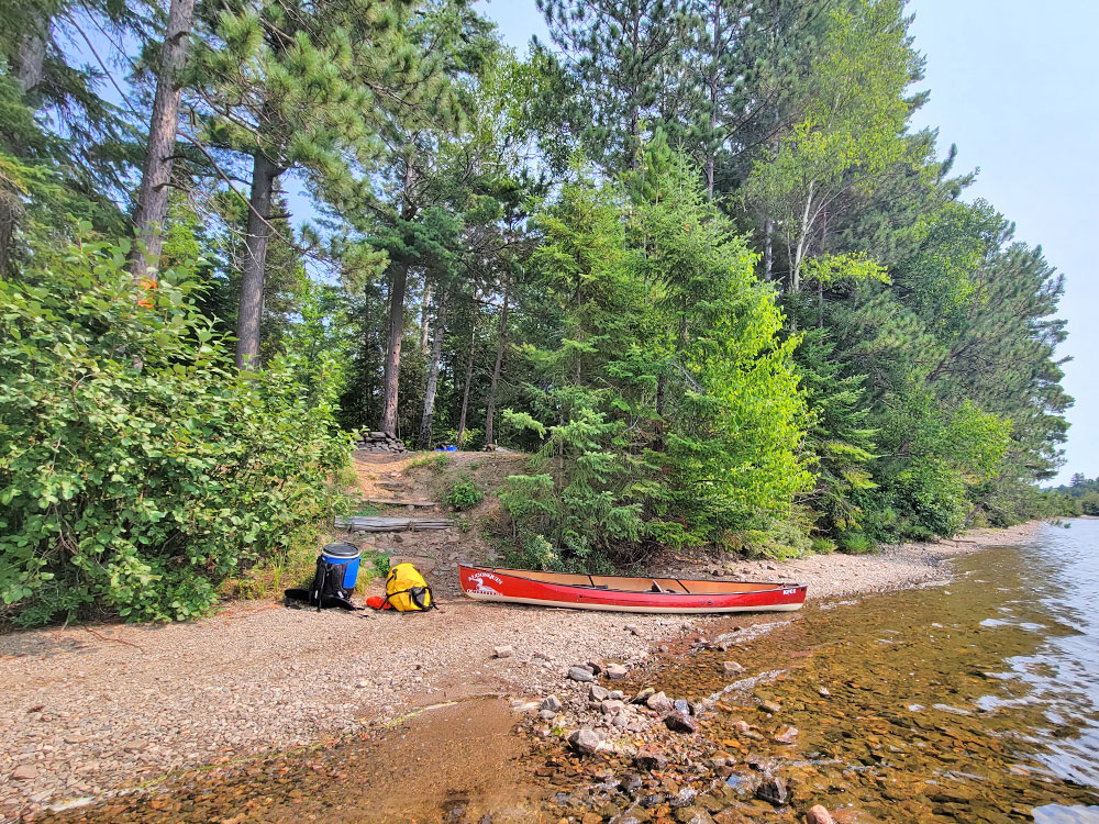 Booth Lake Algonquin Park Campsite 9 Guest Submission Shoreline With Red Canoe