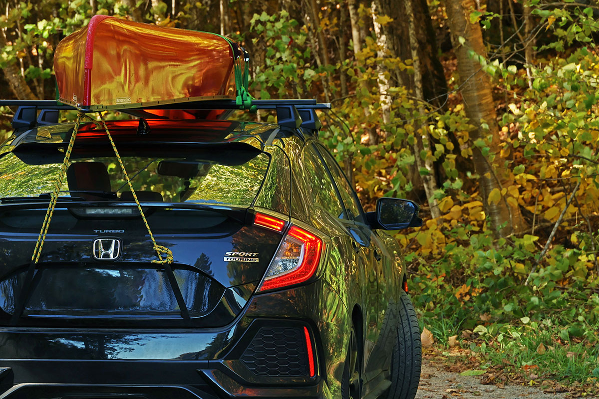Honda Civid With Red Canoe Strapped on Top in Algonquin Park October 2022