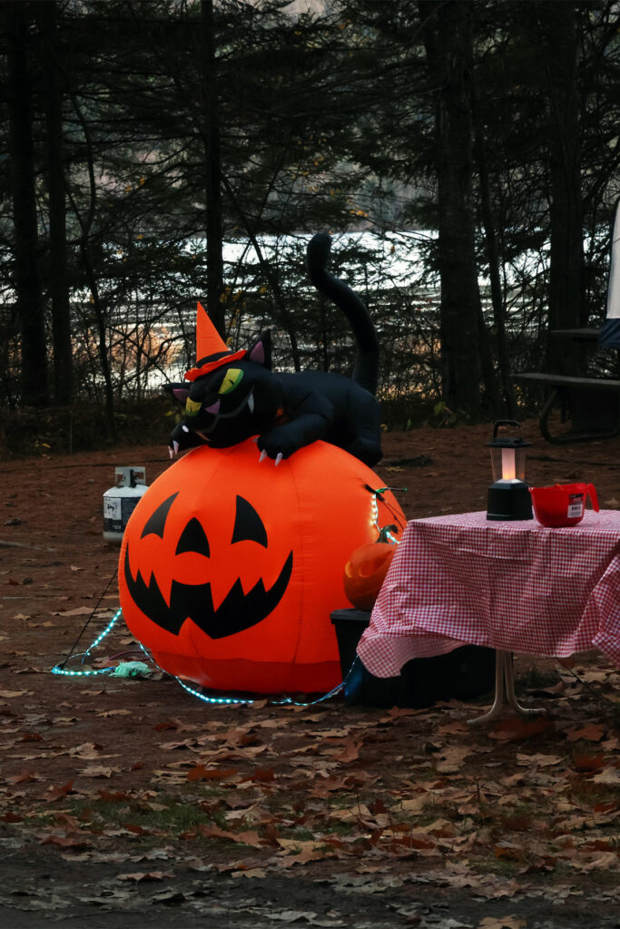 Large inflatable orange pumpkin Halloween decoration at Lake of Two Rivers in Algonquin Park, October 2023