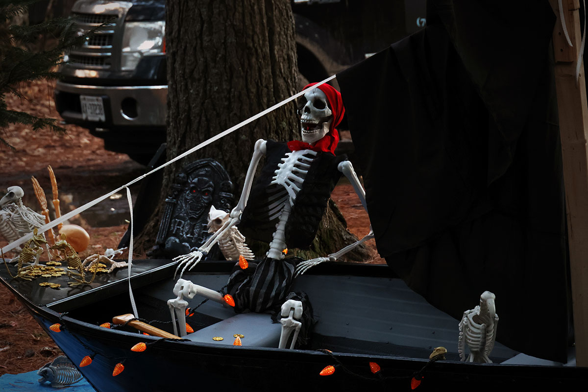 Skull pirate in a boat Halloween decoration at Lake of Two Rivers in Algonquin Park, October 2023