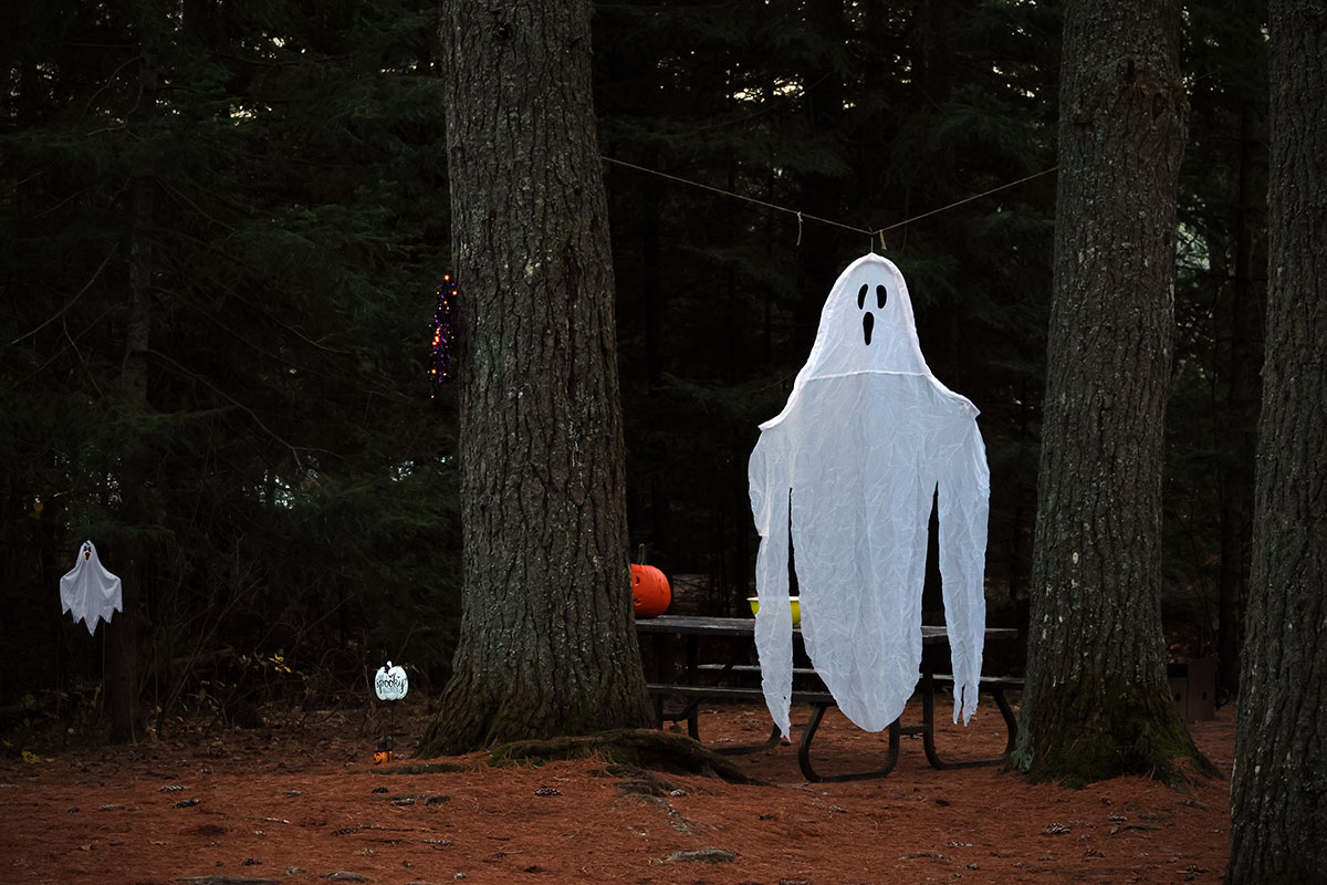 Ghost hanging from clothesline Halloween decoration at Lake of Two Rivers in Algonquin Park, October 2023