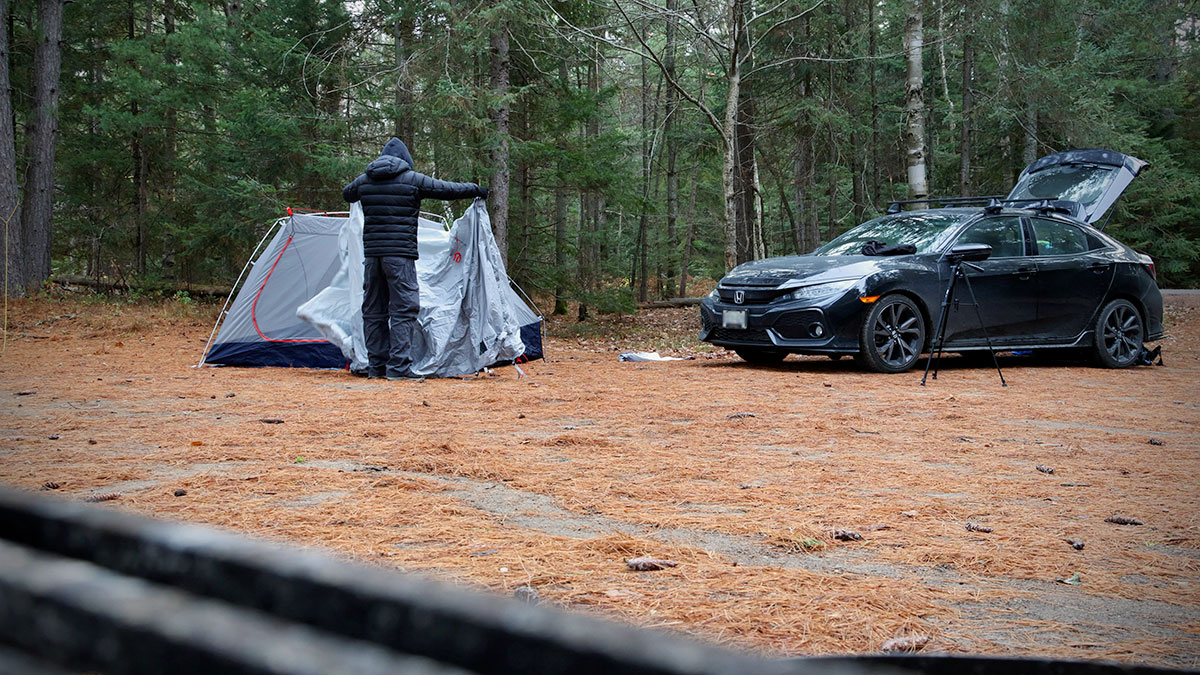 Setting up MEC Ohm 4 tent beside car at Mew Lake campground campsite in Algonquin Park, November 2023 v2