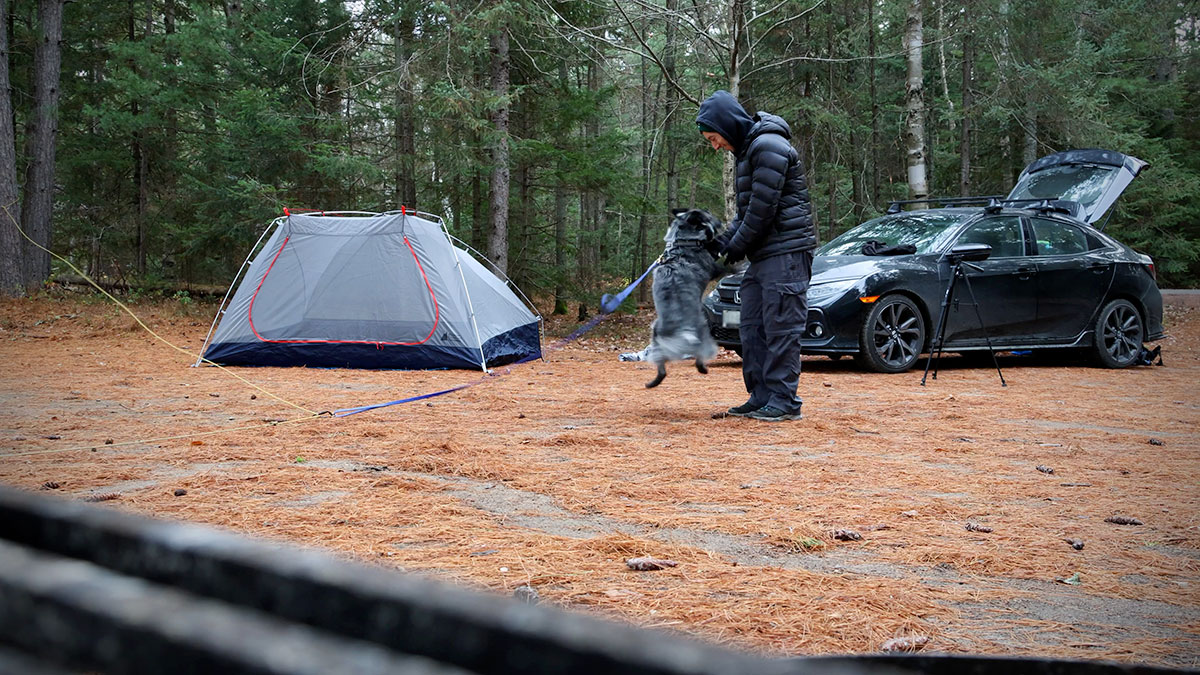 Setting up MEC Ohm 4 tent beside car at Mew Lake campground campsite in Algonquin Park, November 2023 v3